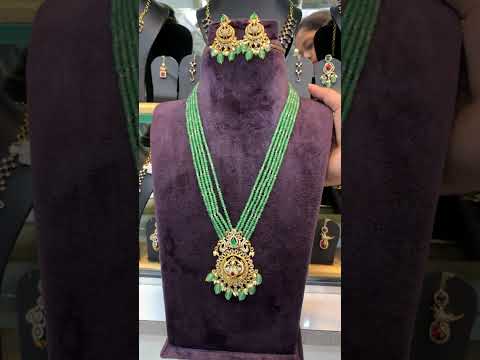 Stunning beads haram with green beads and peacock design pendant